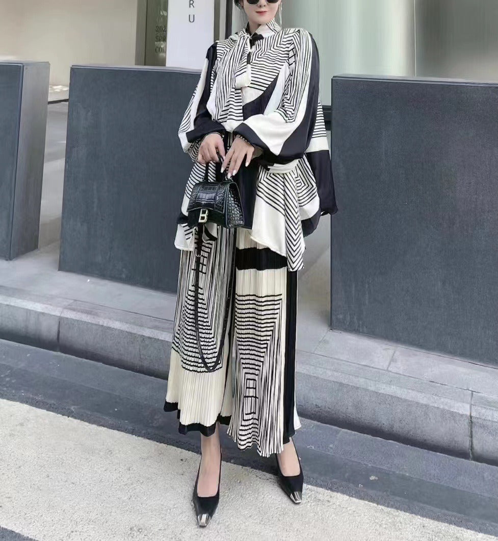 Silhouette cut lantern sleeves butterfly tie flowy belted printed trousers suit - FITzzE